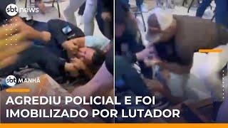 Homem agride policial em bar e é imobilizado por lutador de MMA | #SBTManhã